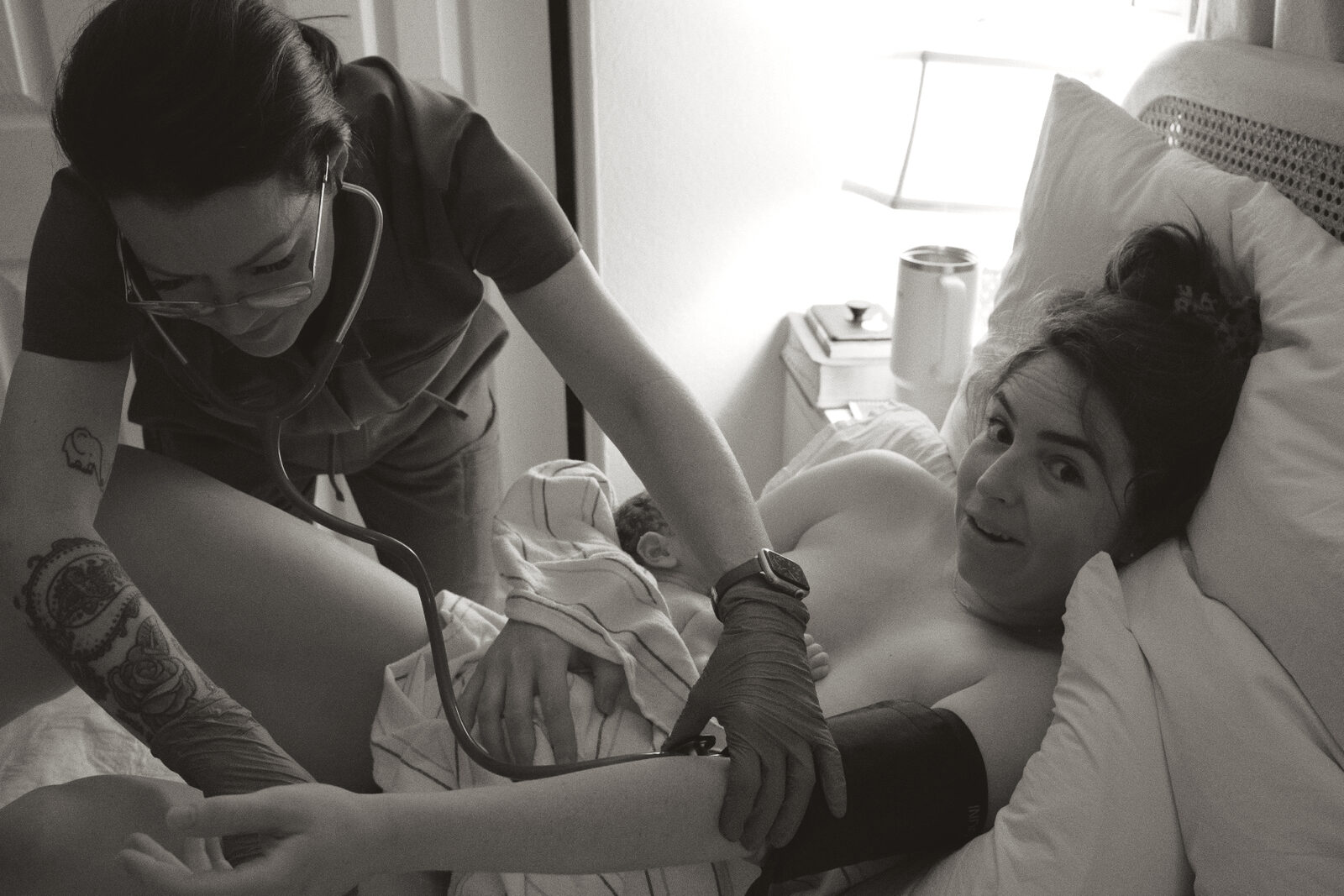 Rhonda tending to a mother and her newborn